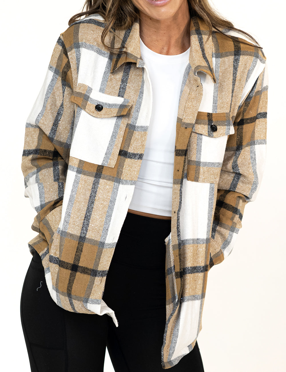 front of the khaki plaid shacket against a white background