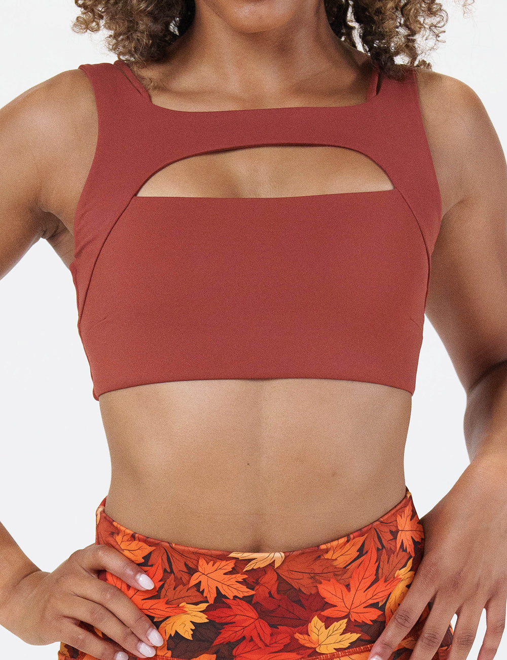 front of the solid auburn red bra against a white background