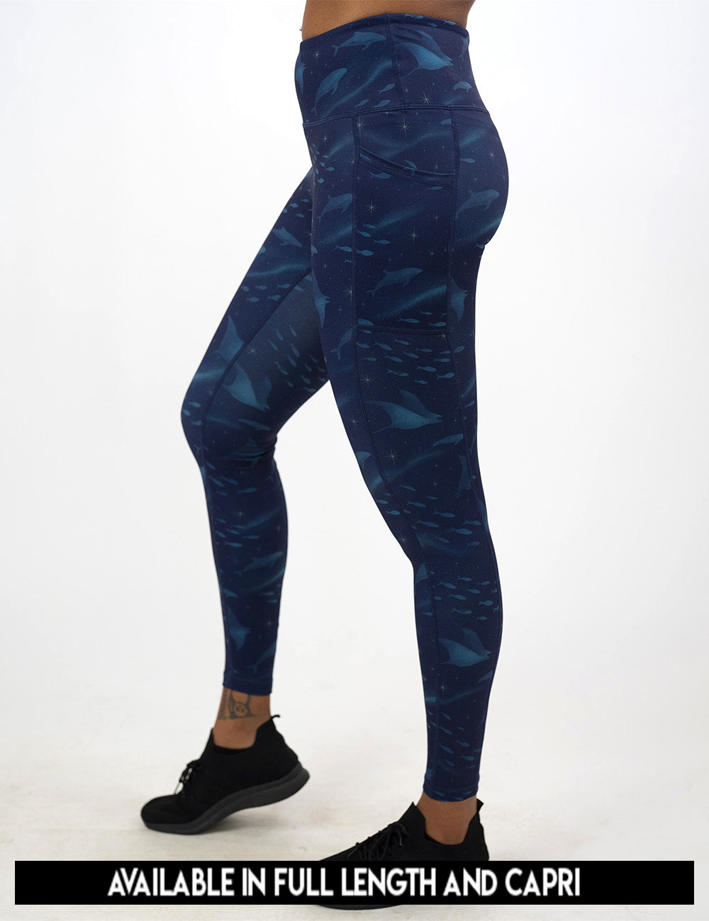 available lengths for the dark blue ocean filled with sting rays, whales, and fish leggings, full length and capri