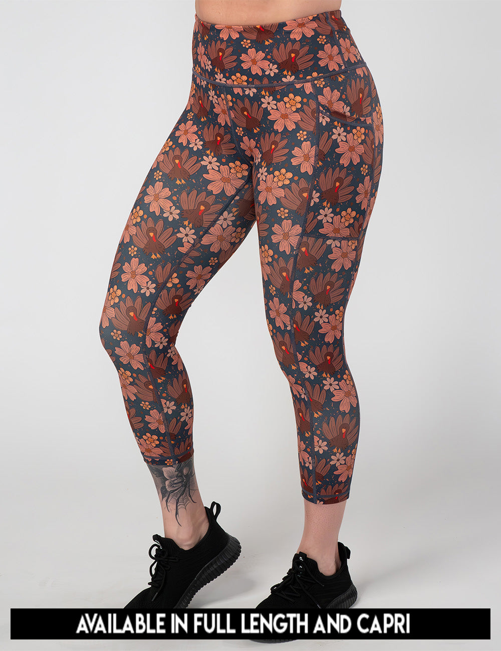 available lengths for the turkeys over a blue background leggings, lengths include full length and capri