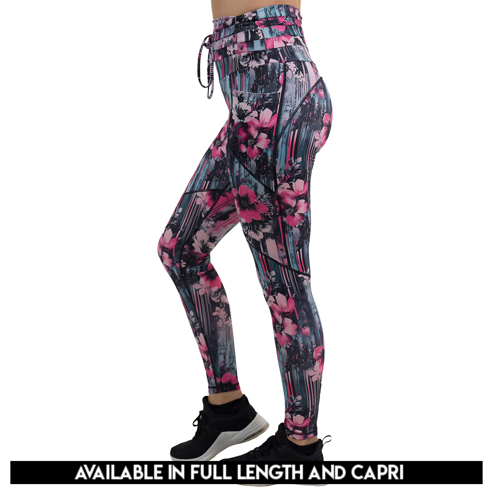 available sizes for the pink flowers against a bold teal and pink striped background pattern leggings, available sizes include full length and capri