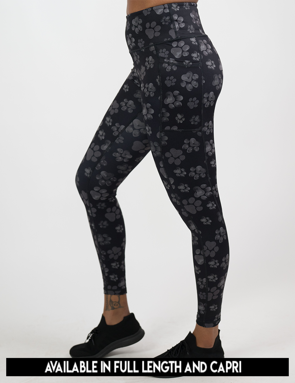 available lengths for the grey pawprints against a black background include full length and capri