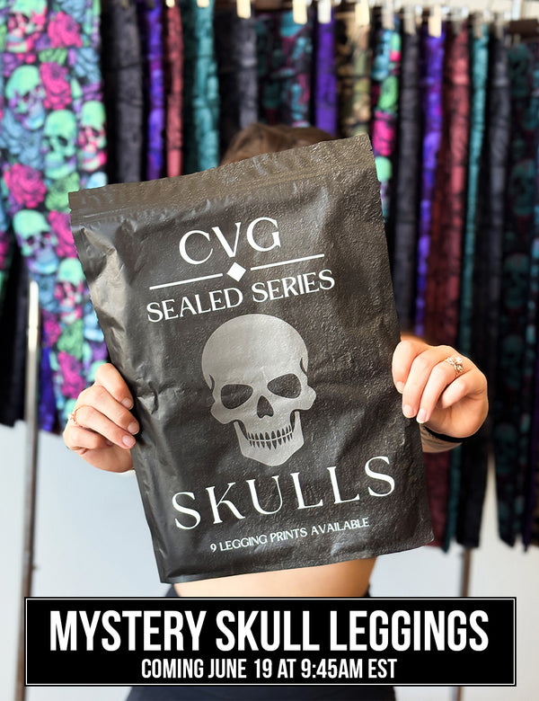 front of the CVG Sealed Series: Skulls Bag featuring a blacked out design with a grey skull in the middle, 9 leggings prints are available