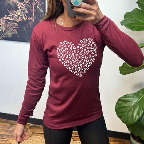 maroon long sleeve shirt with a white leopard heart design
