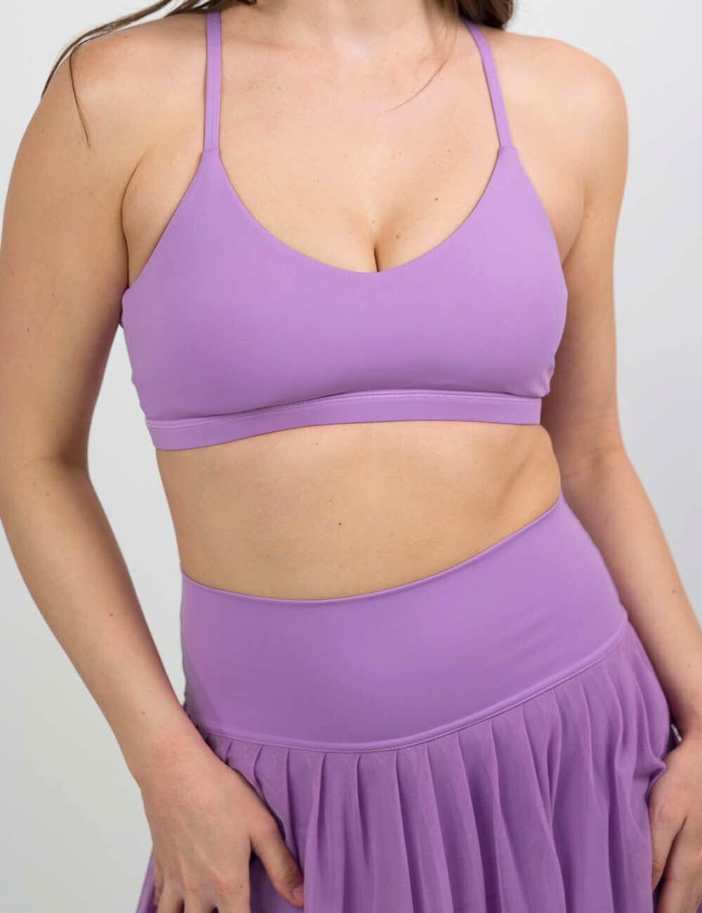 front of the solid purple move free bra against a white background