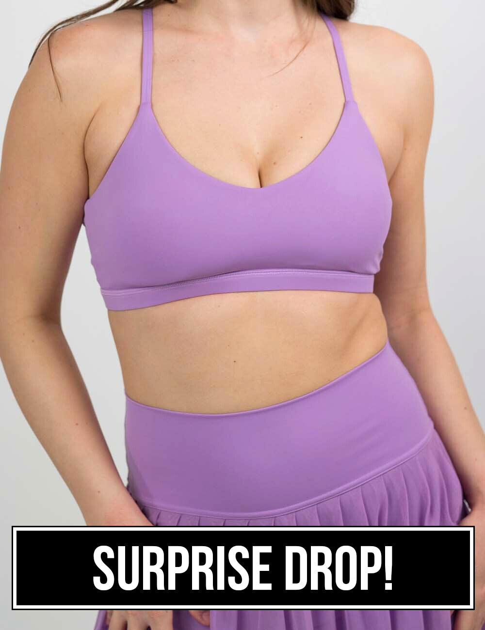 front of the solid purple move free bra against a white background, surprise drop