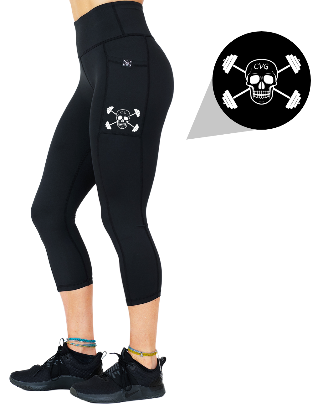 model wearing the cvg skull and barbell graphic capri solid black leggings against a white background