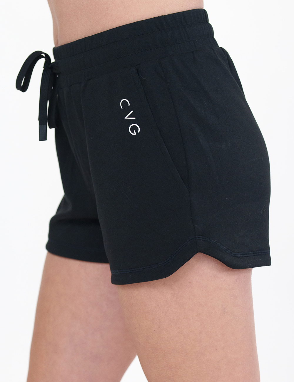 black drawstring shorts facing the side against a white background