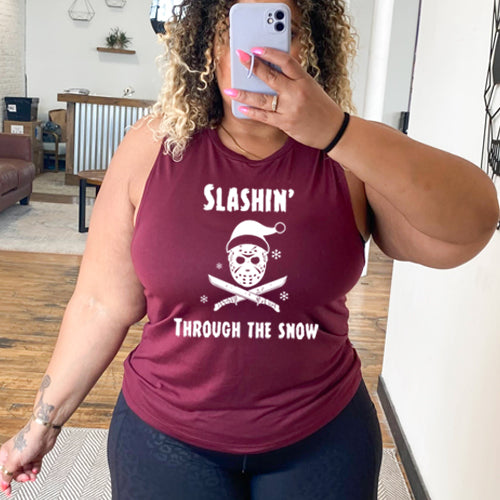 model wearing maroon muscle tank with black slashin through the snow design on it