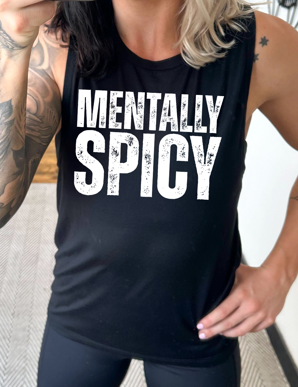 black muscle tank with the words "mentally spice" on it