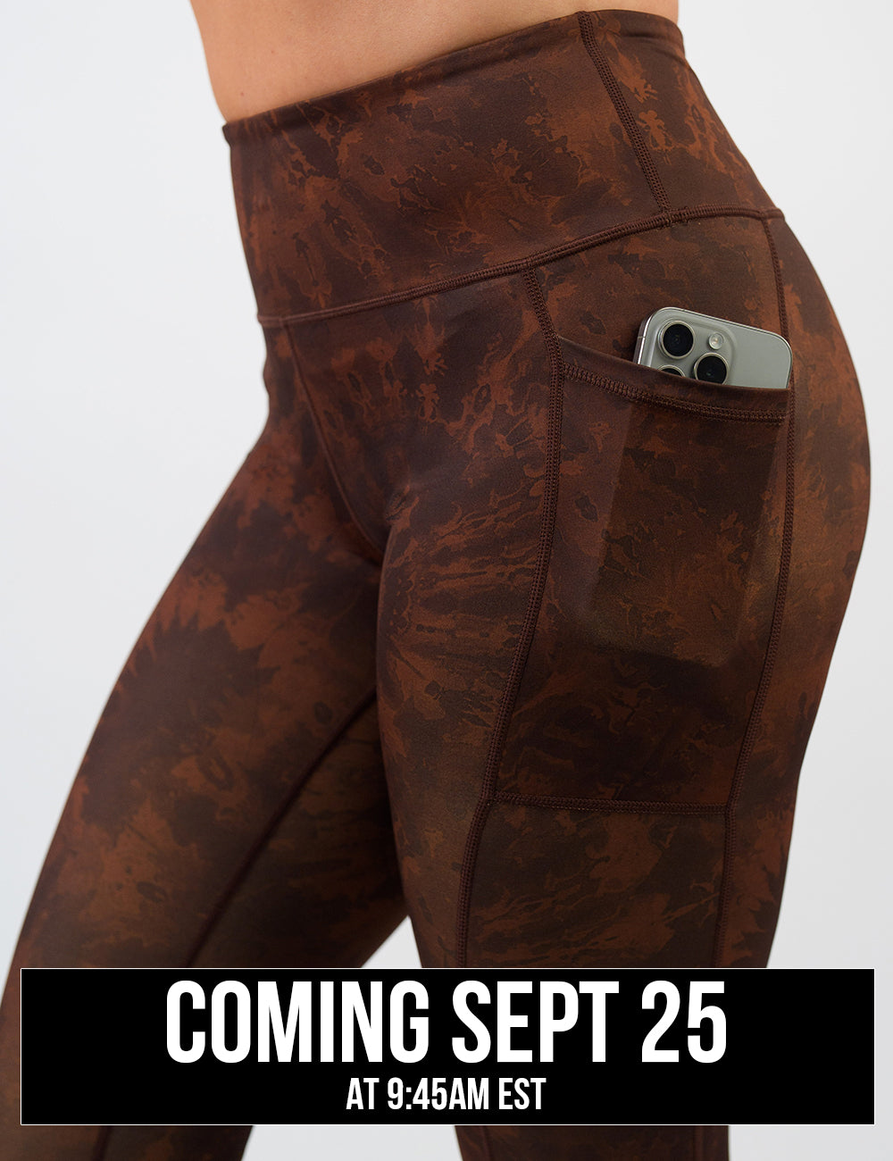 close up of the brown tie dye leggings with a phone in its pocket coming September 25th