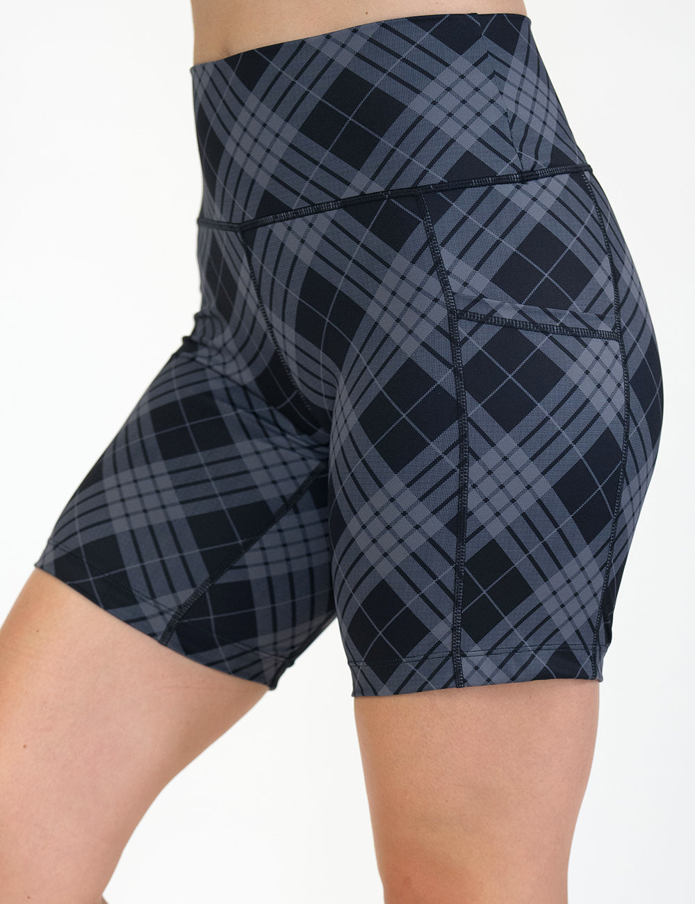 front of the 7 inch monochrome colored plaid shorts against a white background