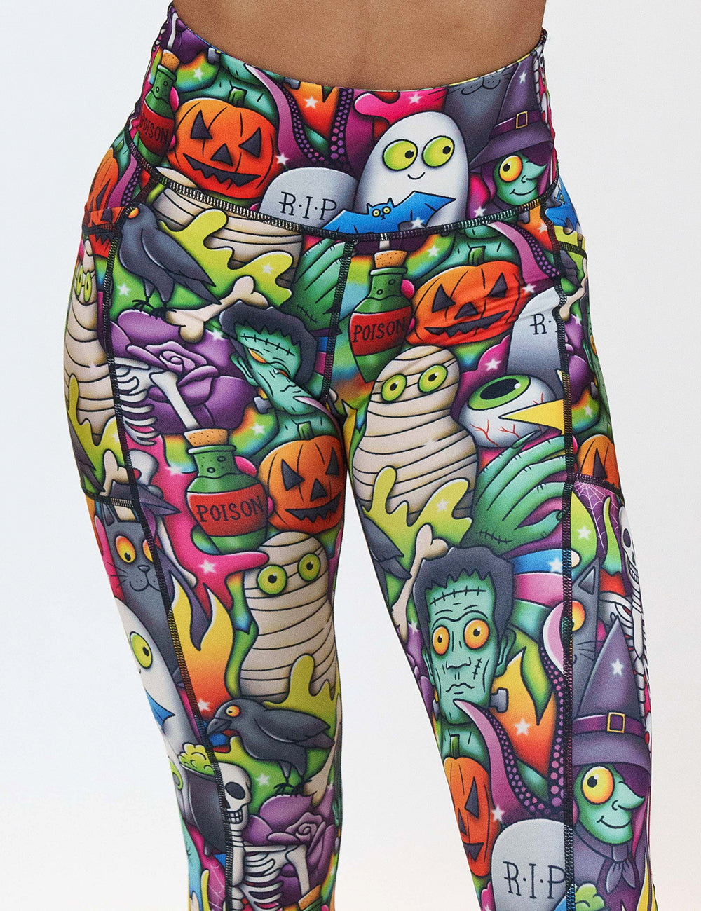 front of the Halloween characters leggings against a white background
