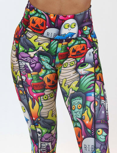 front of the Halloween characters leggings against a white background