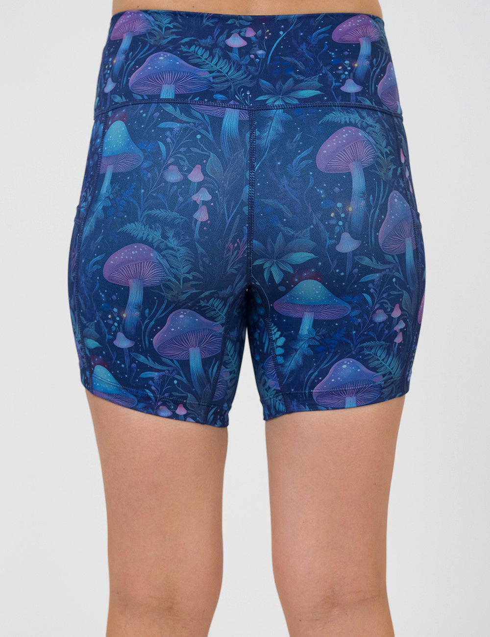back of the 5 inch blue and purple mushroom and foliage design shorts against a white background