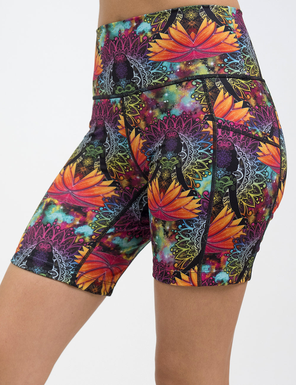 front of the 7 inch colorful yoga lotus flower shorts against a white background