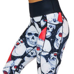 side view of santa skull print leggings