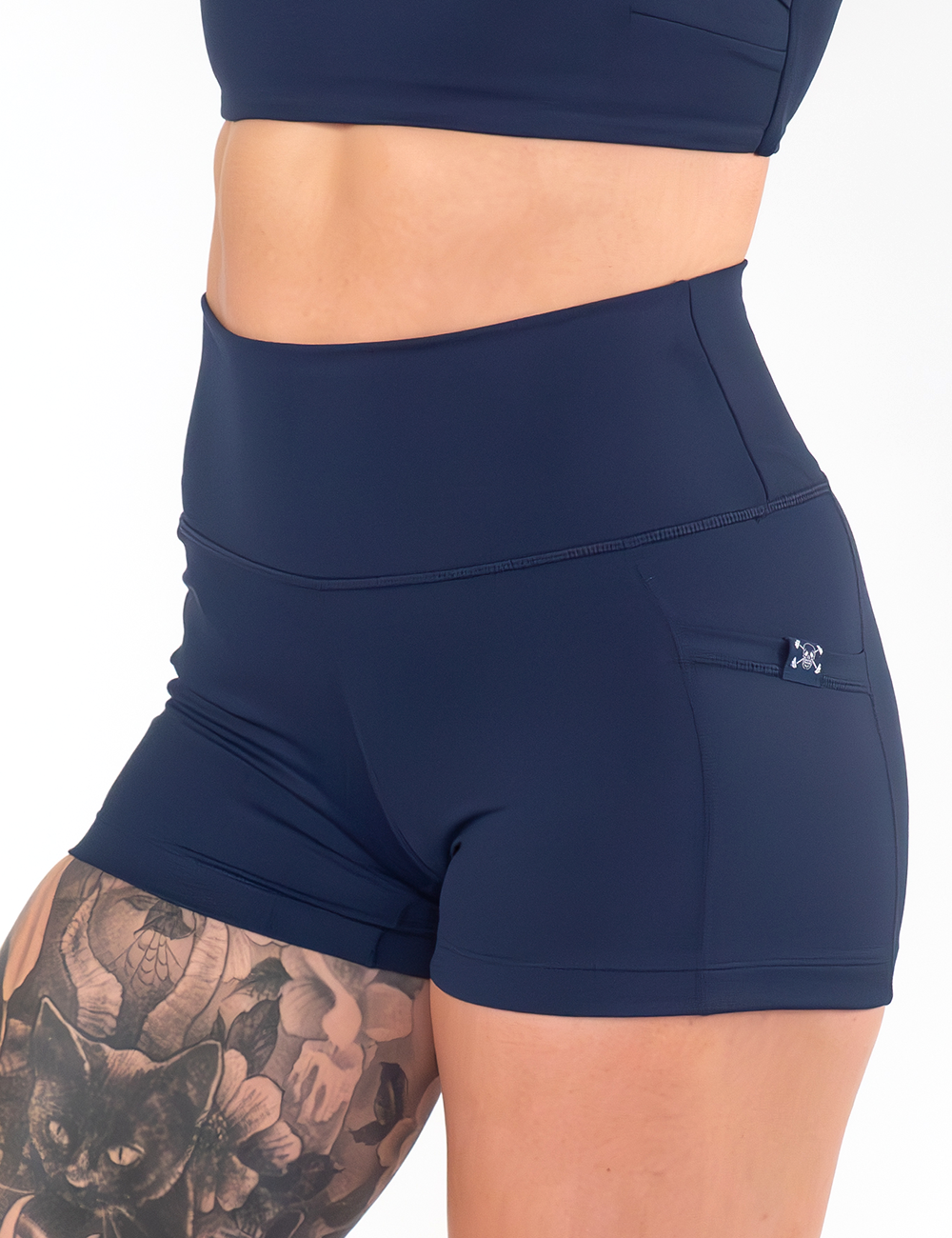 front of the 2.5 inch solid navy shorts against a white background