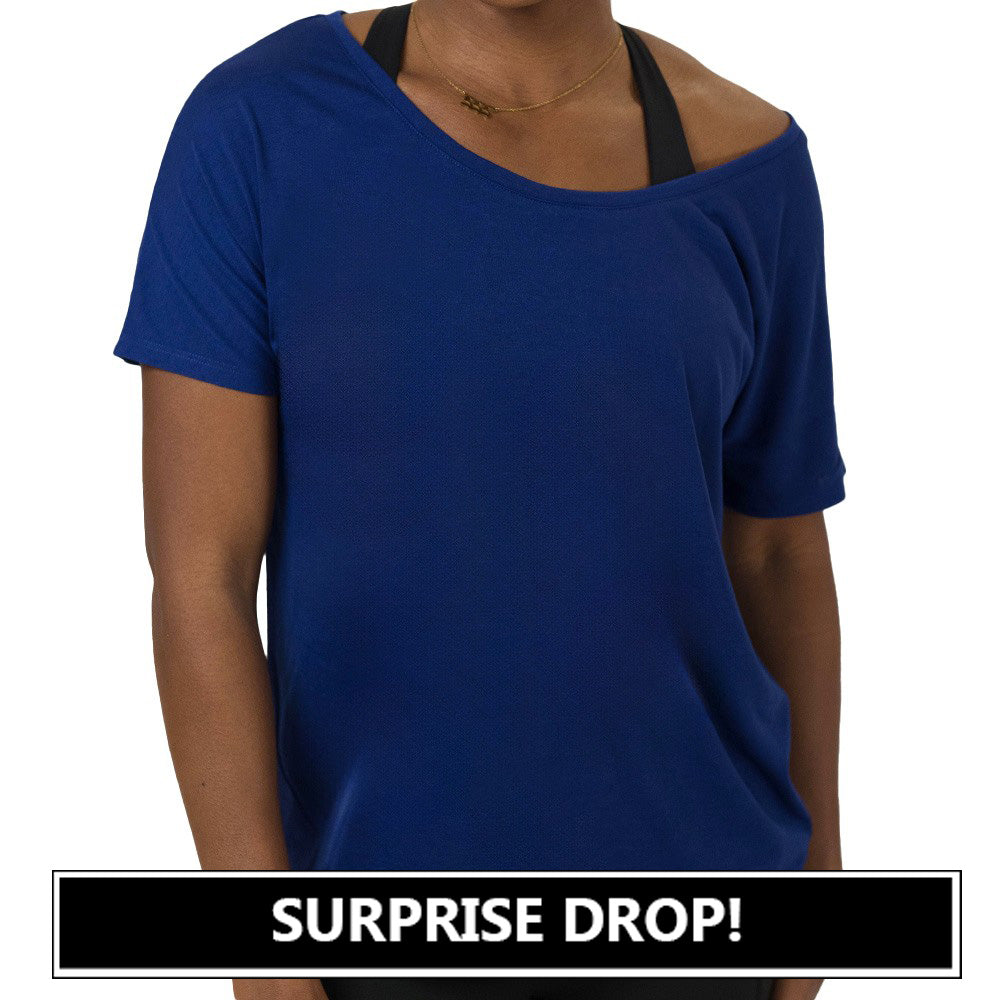 Blue off-shoulder top worn by a person on a white background with 'SURPRISE DROP!' text at the bottom.