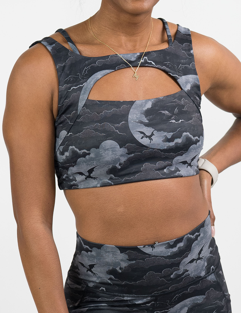 front of the dark dragon against moonlit clouds pattern vista bra against a white background