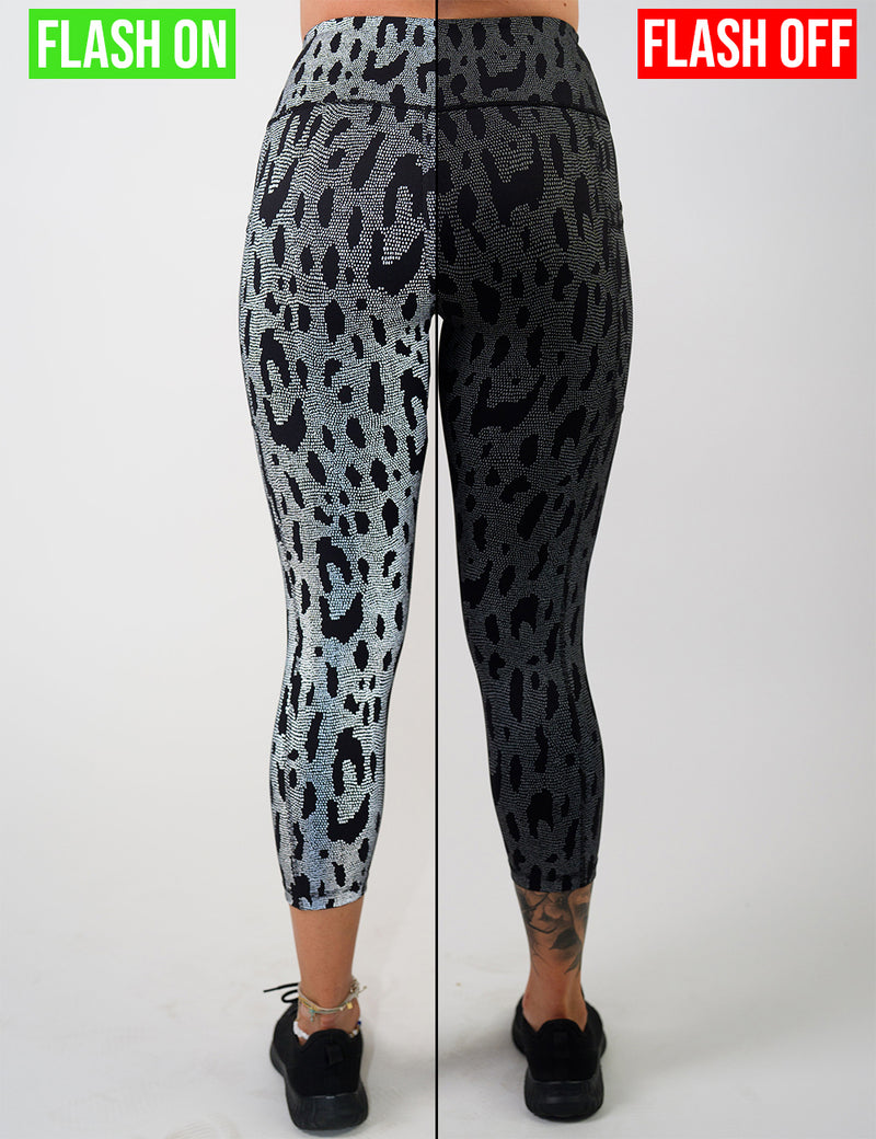 graphic showing the color of the dark spots surrounded by a reflective background leggings with and without the flash being turned on