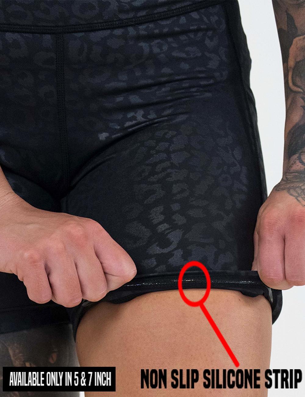 close up of the black leopard print shorts rolled up to show the non slip silicone strip lining found in only the 5 and 7 inch inseam lengths