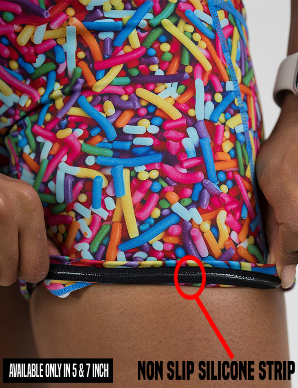close up of the rainbow sprinkles shorts rolled up to show the non slip silicone strip found in only the 5 and 7 inch inseam lengths