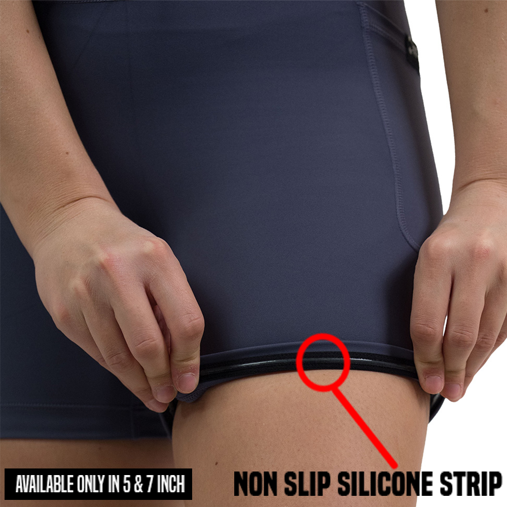 close up of rolled up twilight purple shorts to show the non slip silicone strip found in 5 and 7 inch omni twilight purple shorts