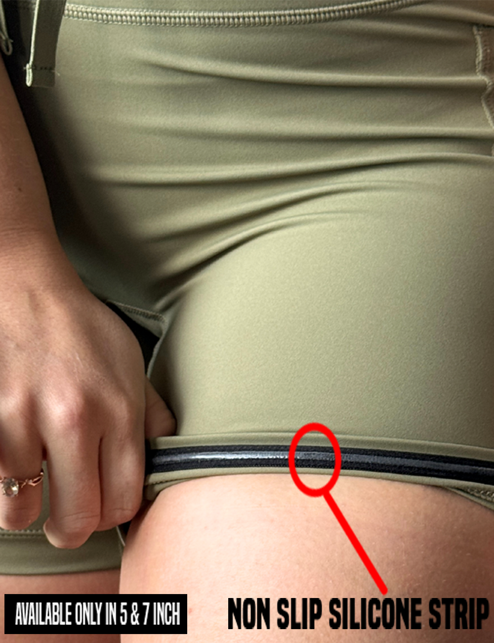 close up of the omni solid green shorts rolled up to show the non slip silicone strip found only in the 5 and 7 inch ineseam
