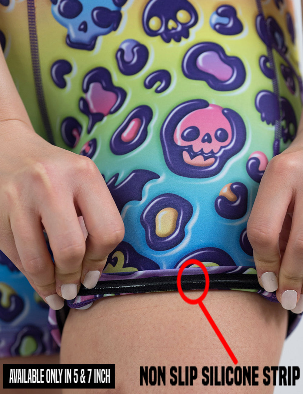 close up of the rainbow leopard print pumpkins and skulls shorts showing the non slip silicone strip found in the 5 and 7 inch shorts