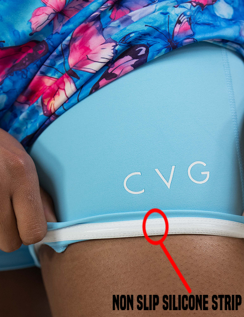 red butterflies against a blue background dress shorts rolled up to show the non slip silicone underneath