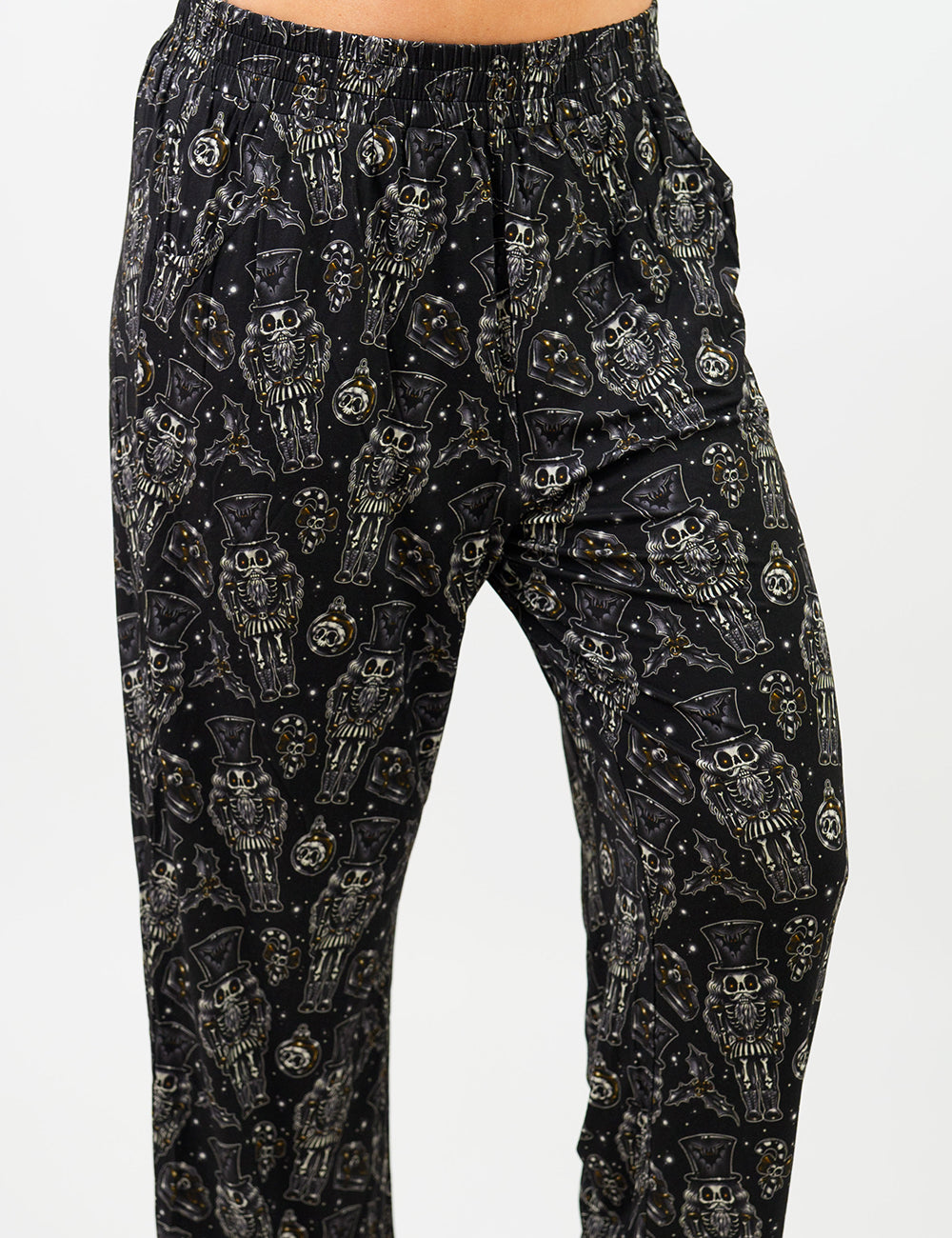 close up of the black nutcrackers, mistle toe, and Christmas ornaments pajama bottoms, coming October 23