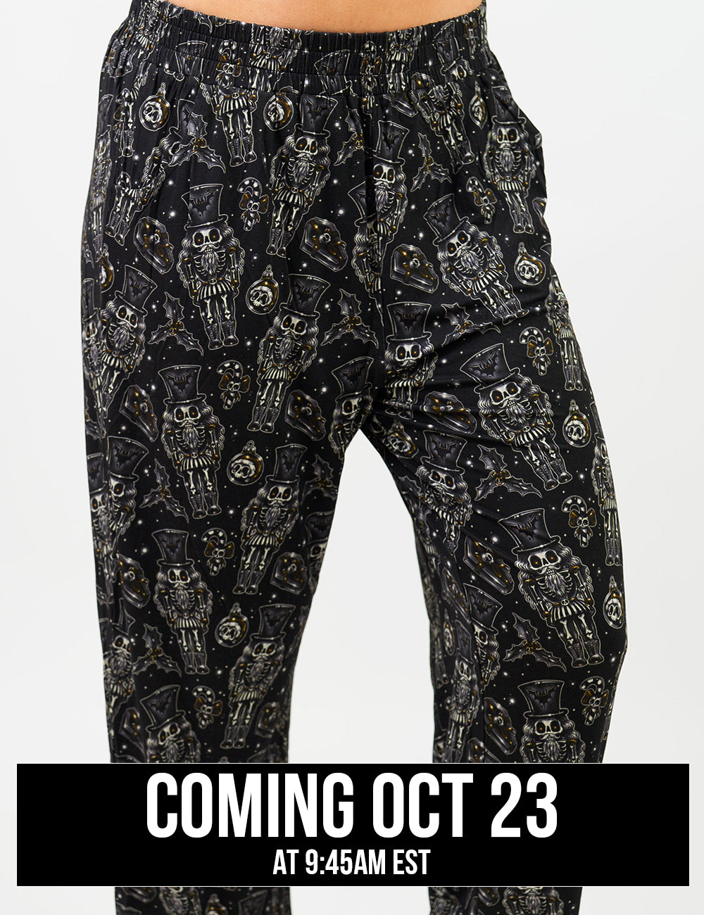 close up of the black nutcrackers, mistle toe, and Christmas ornaments pajama bottoms, coming October 23