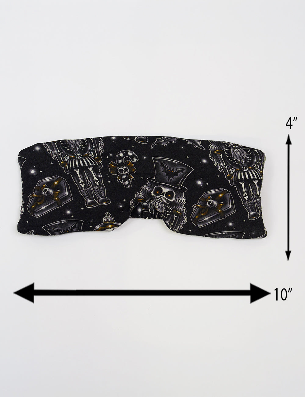 measurements for the black nutcrackers, mistle toe, and Christmas ornaments eye mask, measurements are 4 inches by 10 inches
