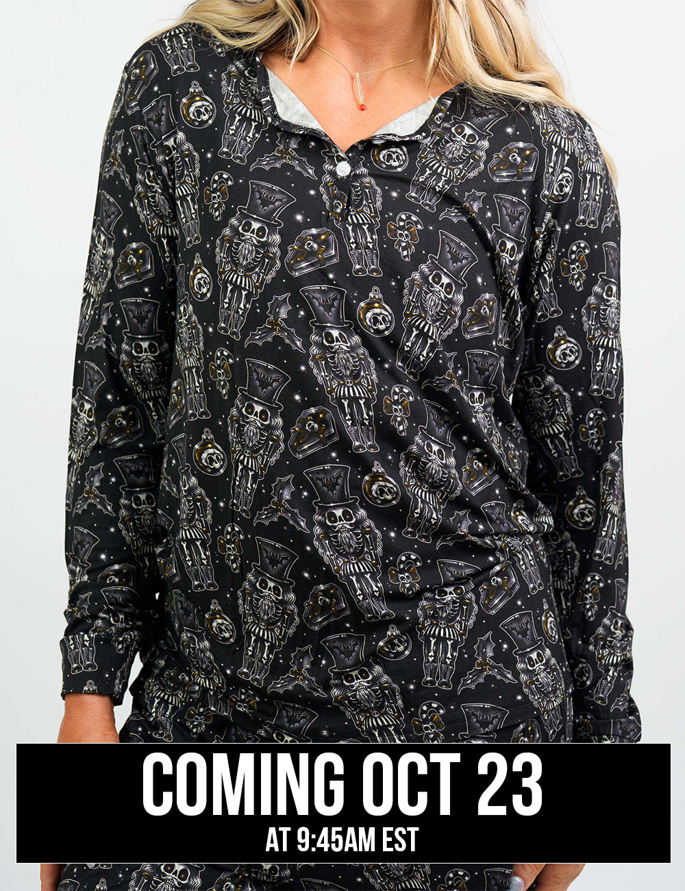 front of the black nutcrackers, mistle toe, and Christmas ornaments pajama top coming October 23rd