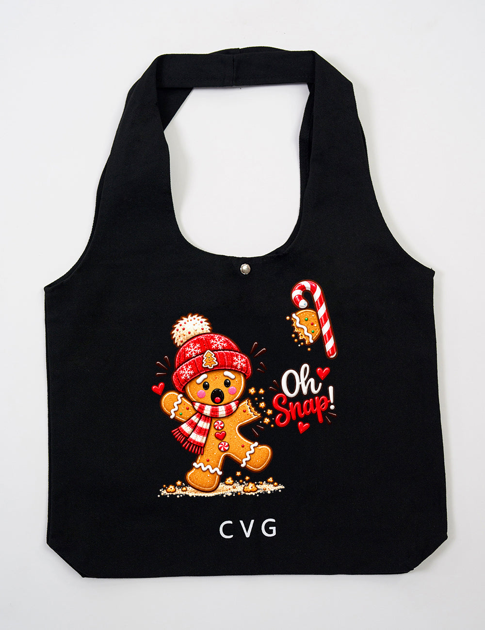 Black tote bag with the CVG logo featuring the "Oh Snap!" Gingerbread graphic