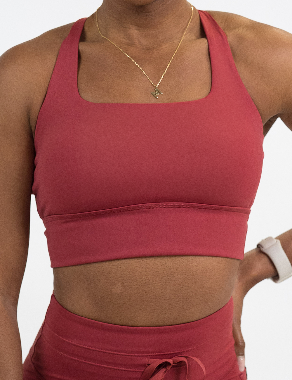 front of the omni solid red longline bra against a white background