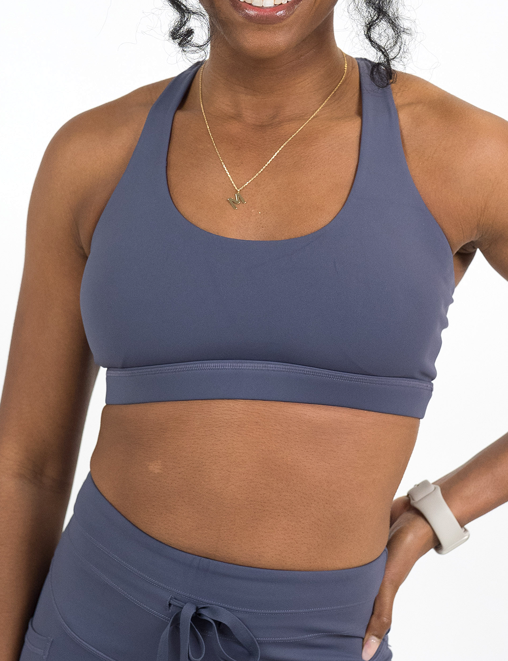 front of the solid purple omni butterfly back bra against a white background