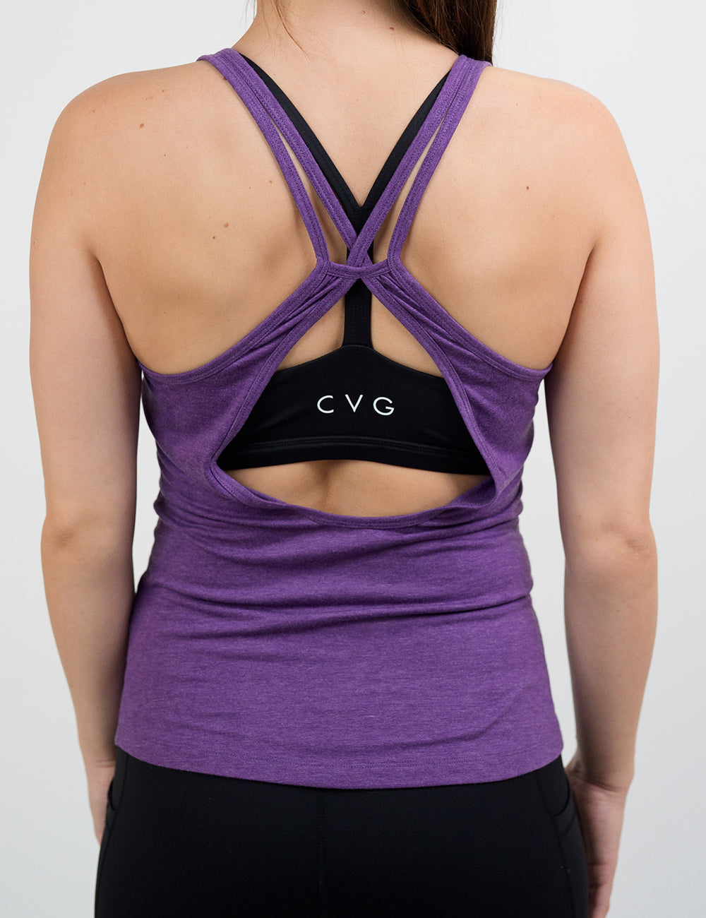 back of the purple open back tank top against a white background