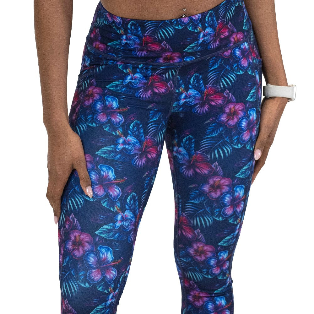 blue and pink tropical flower patterned leggings