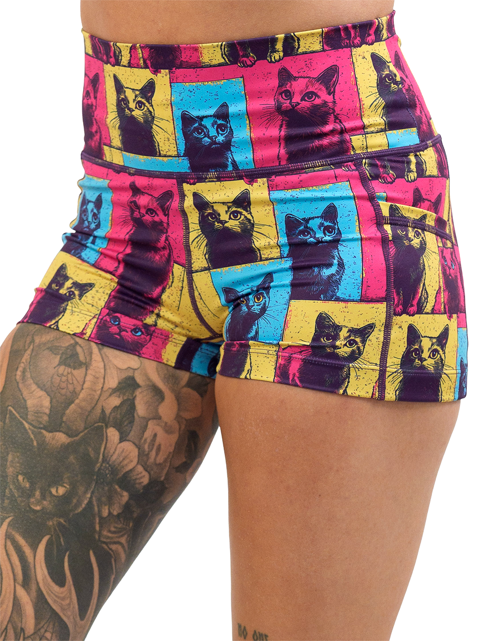 red, blue, and yellow patchwork cat print 2.5 inch shorts facing the front against a white background