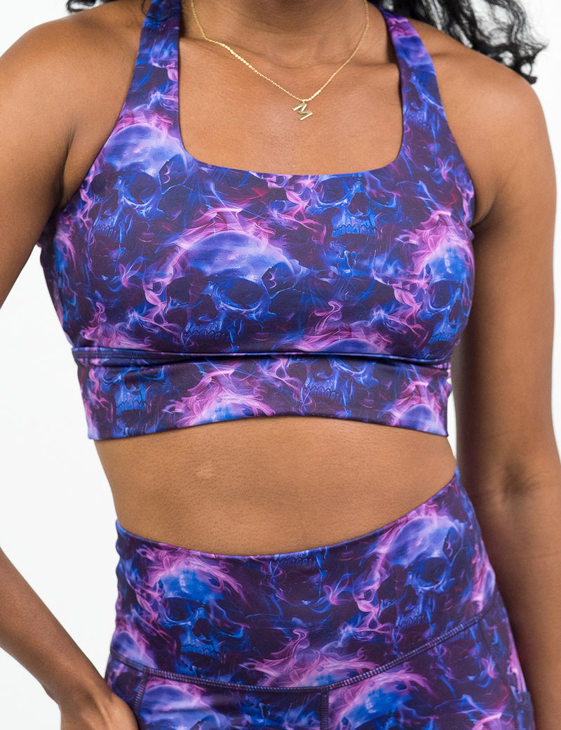 front of the blue and purple ghost skull longline bra
