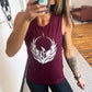 model wearing a maroon muscle tank with a phoenix design on the front