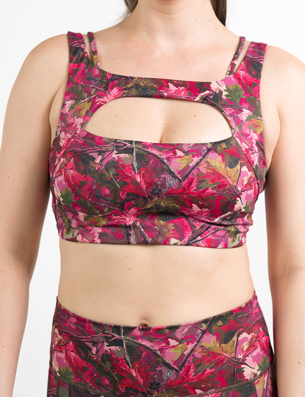 front of the pink forest camo vista bra against a white background