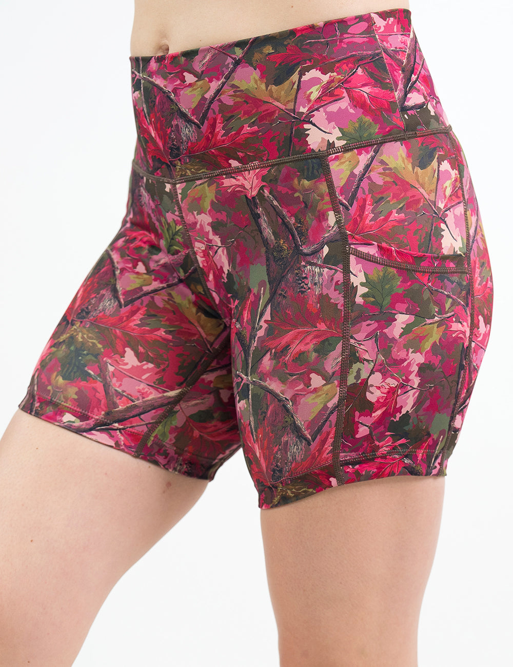 front of the 5 inch pink forest camo shorts against a white background