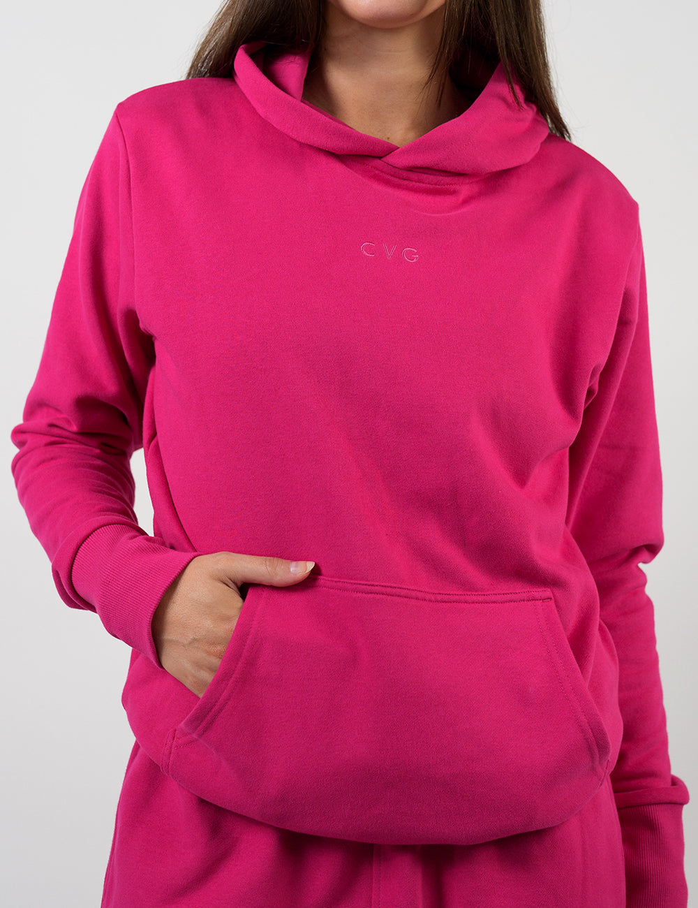 front of the pink hoodie with a subtle CVG logo