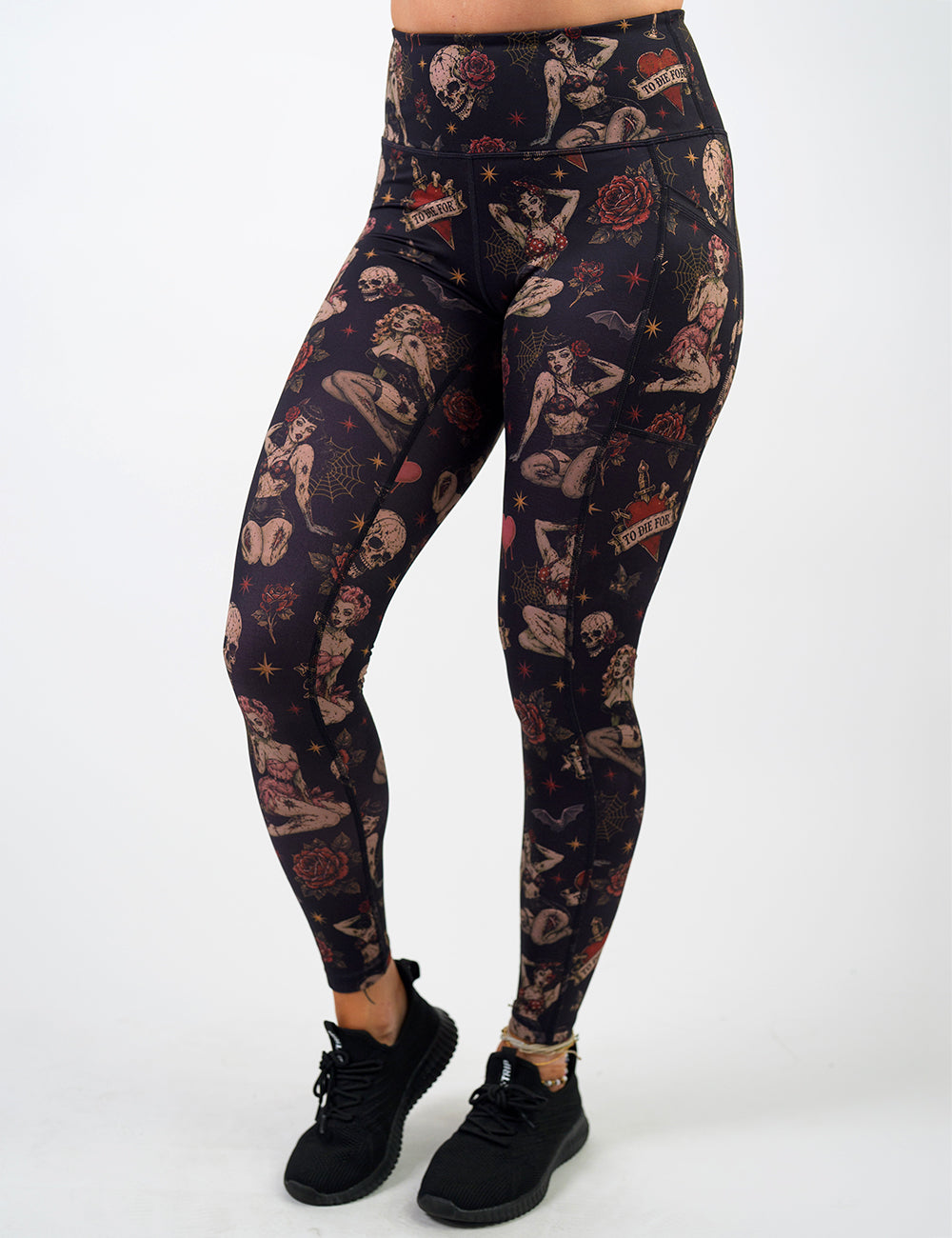 front of the zombie girls with pin up hair and traditional tattoo designs full length leggings against a white background