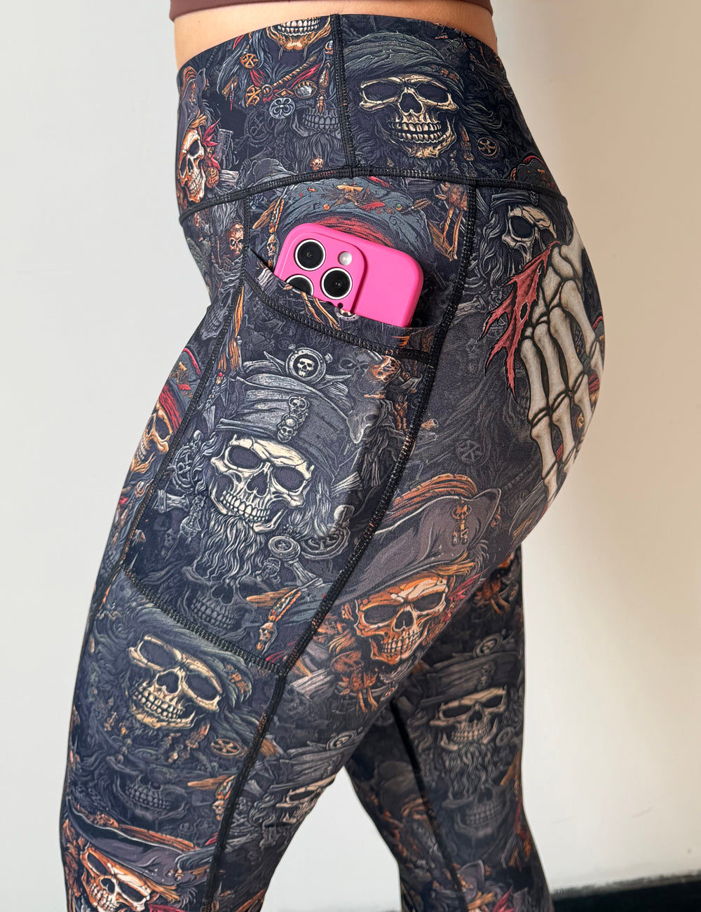 side view of the leggings showing a phone in the pocket