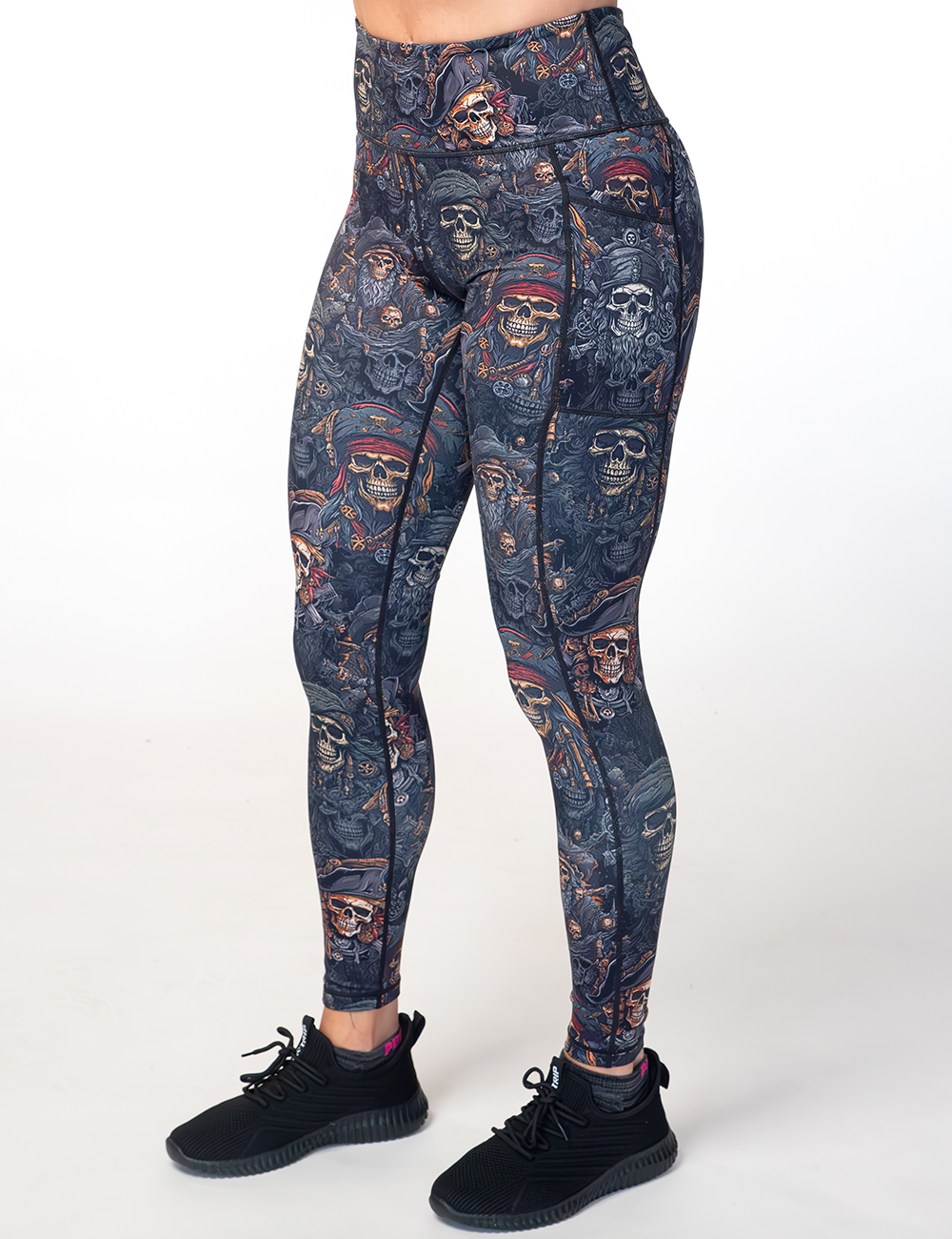 model wearing the full length pirate skulls leggings against a white background