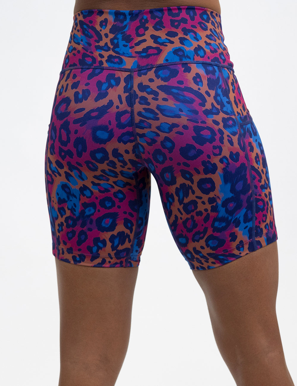back of the 7 inch  yellow, red, and blue leopard print shorts against a white background